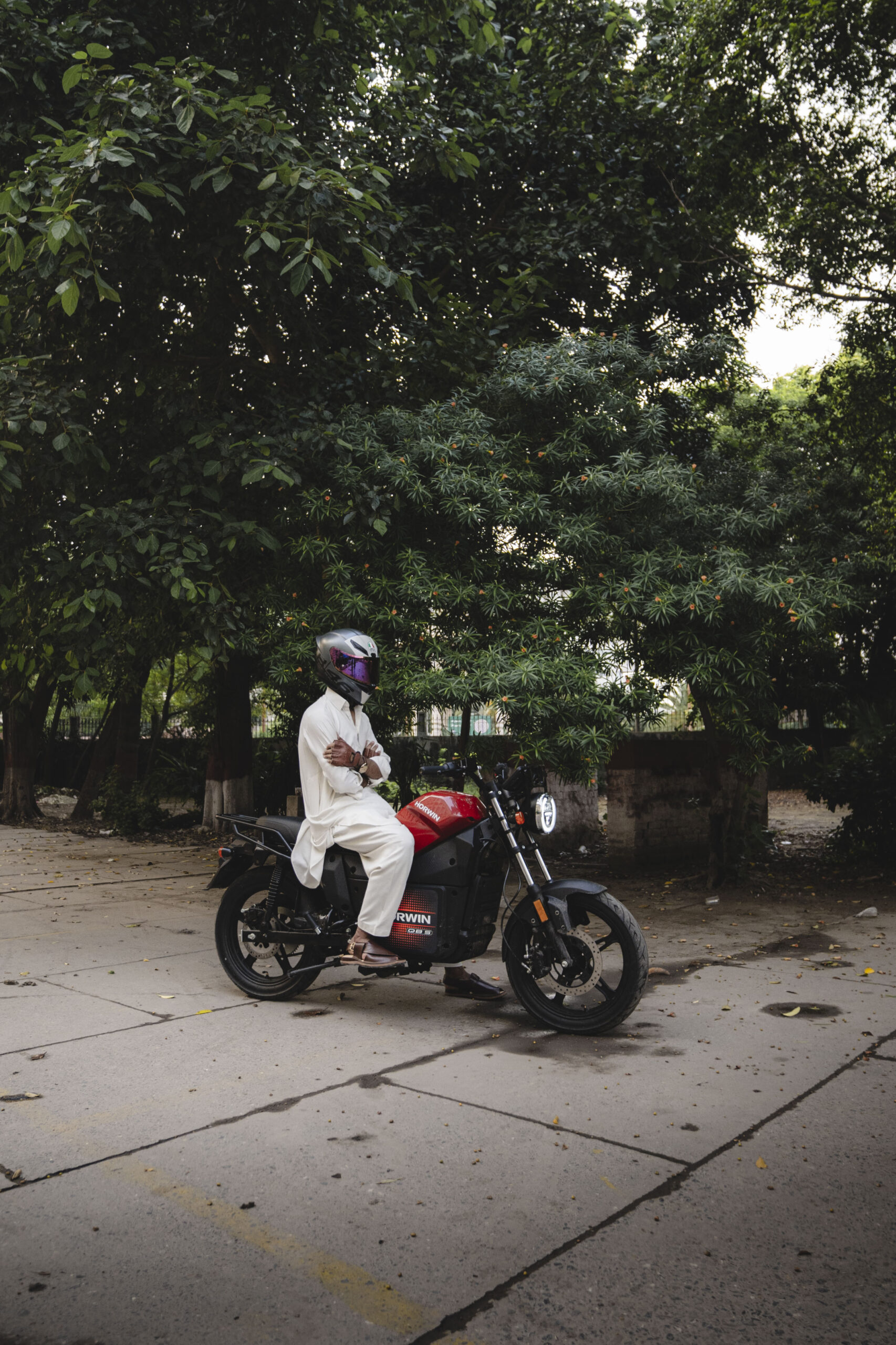 Cinematic: Horwin QB5 Pro electric motorcycle parked street side in an urban setting